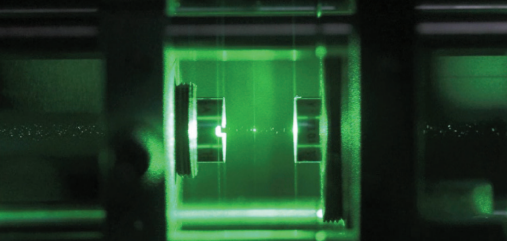 Dr. James Millen overseeing levitated nanoparticle research at King’s College London, with advanced photonic technologies including Moku:Pro and Laser 2000. Precision control using laser beams for groundbreaking results in quantum physics and nanotechnology